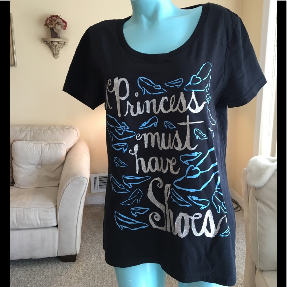 The shirt says it all !! Authentic Disney! 👠